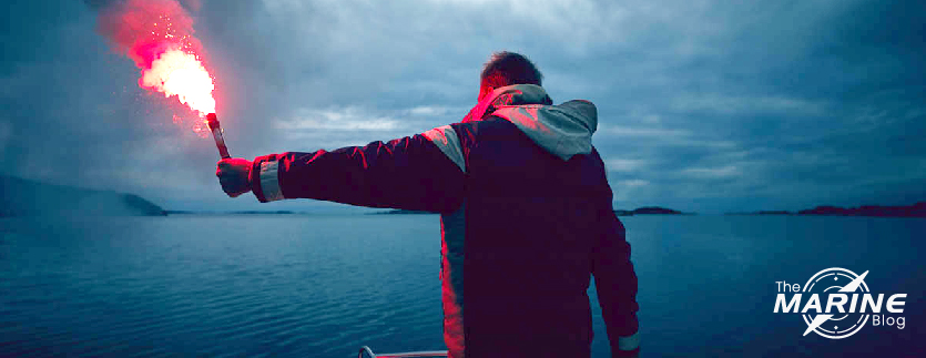 a-man-using-a-signal-flare-on-a-boat-signalling-to-a-ship